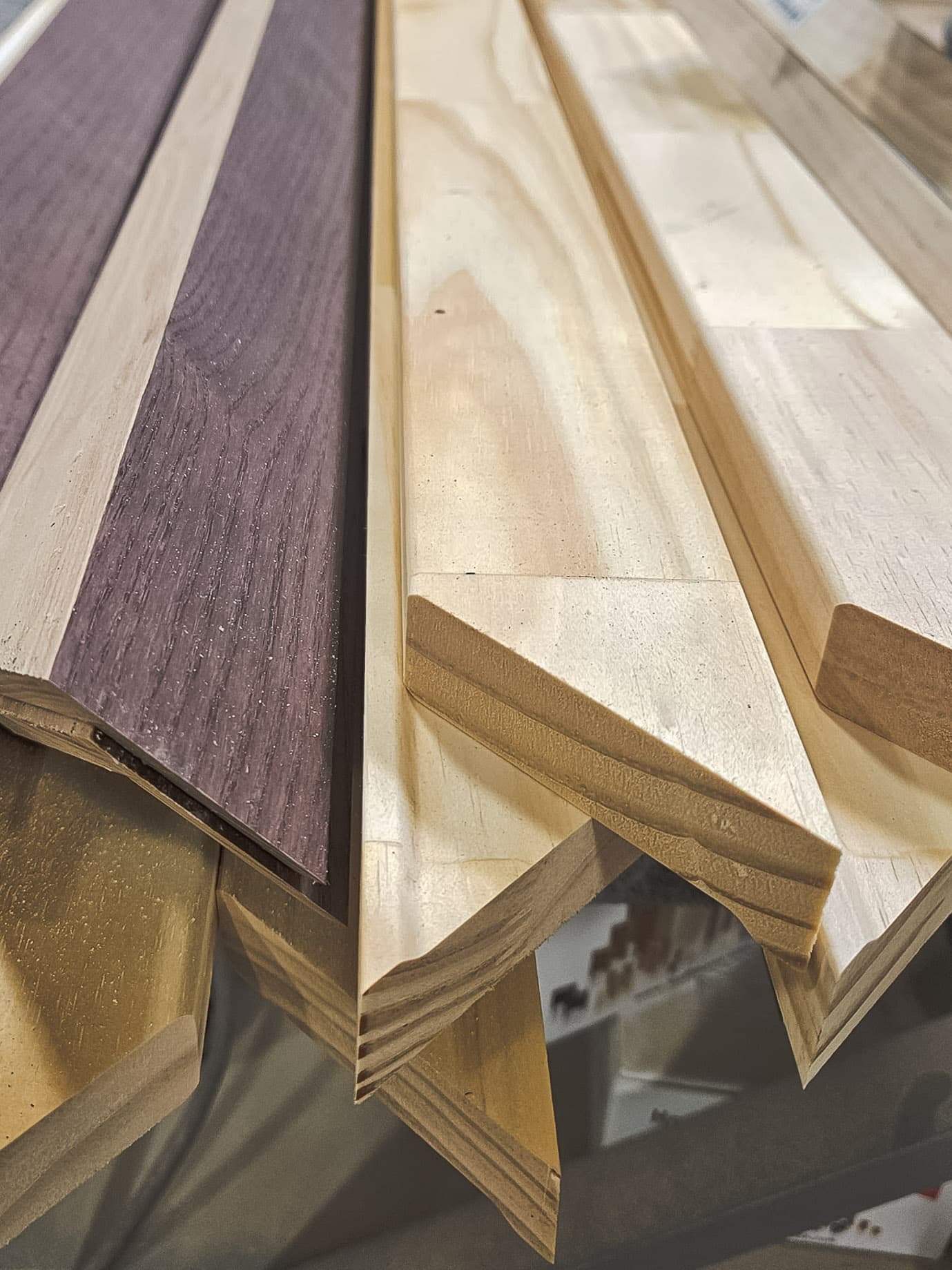 Mitres of custom hardwood frames in workshop